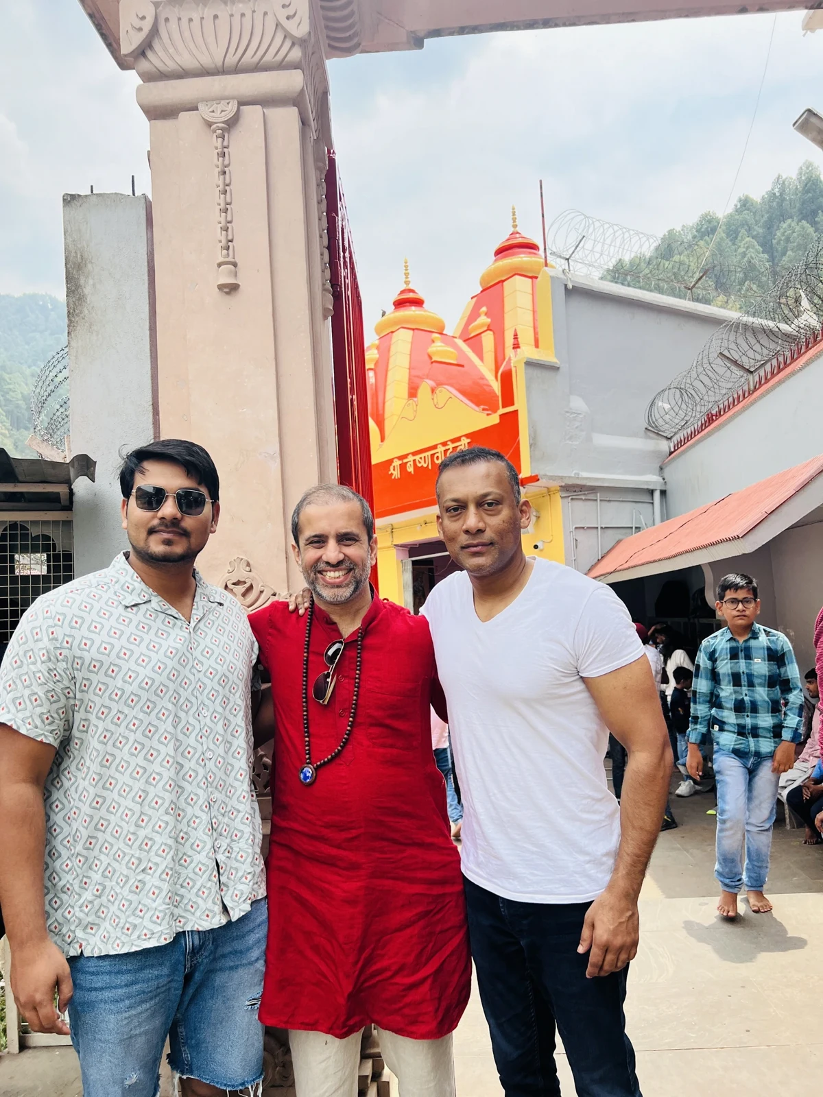 Our founder with friends at the gates of Kainchi Dham